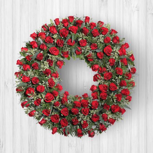 Corona de rosas rojas