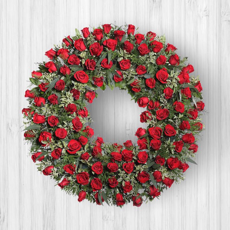 Corona de rosas rojas